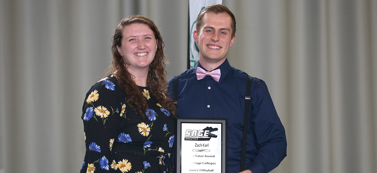 Head Men's Volleyball Coach Rachel Martin presents Zackery Karl with Gator of the Year for the men's volleyball program.
