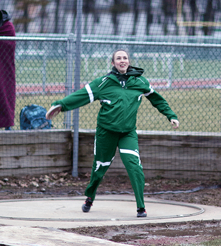 Thayer breaks her own record in the discus to lead Gators at Twighlight Meet